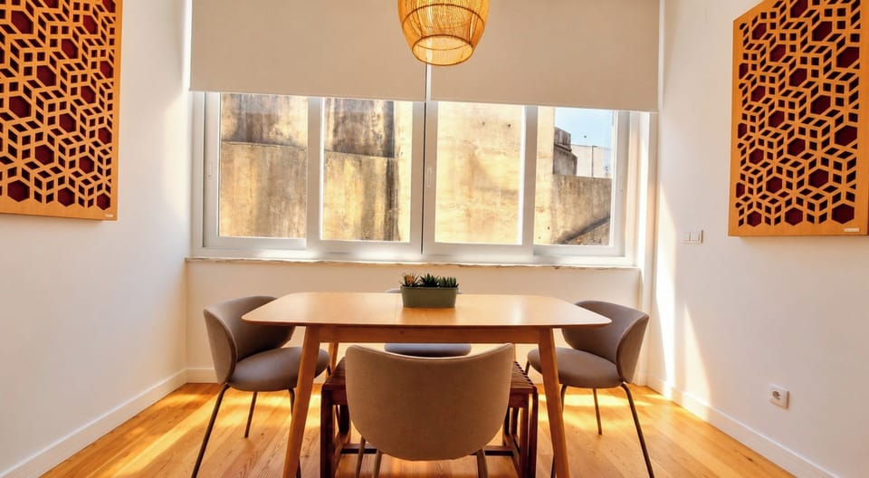 Stylish lounge with a generous sofa, curated artwork and warm wood furnishings