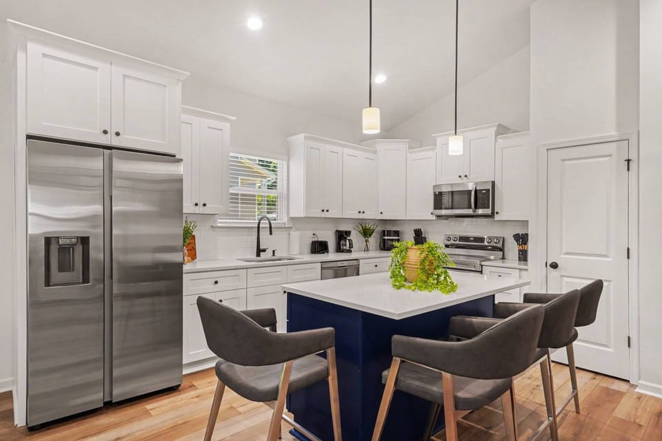 A sleek, modern kitchen with island seating that brings everyone together.