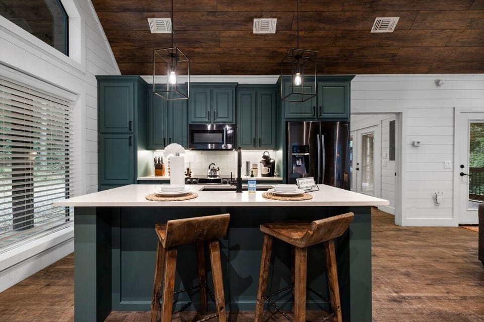 Modern kitchen island with seating for casual meals and coffee.
