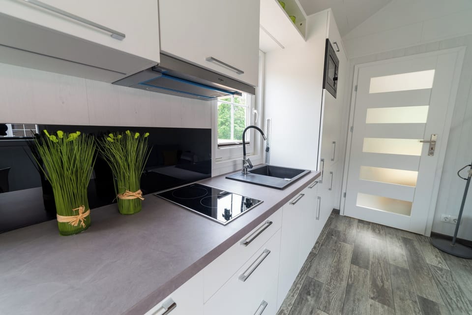 Comfort Chalet, Park View | Private kitchen | Full-size fridge, microwave, stovetop, dishwasher