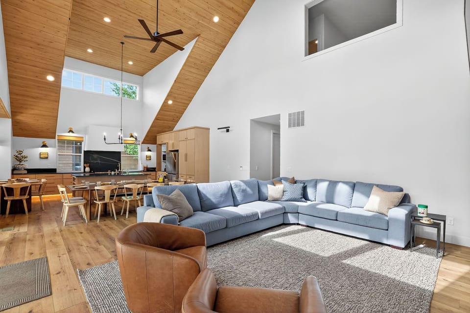 Premium linens, cozy throws, and carefully chosen décor pieces give the home a collected, rather than “rental,” feel.
