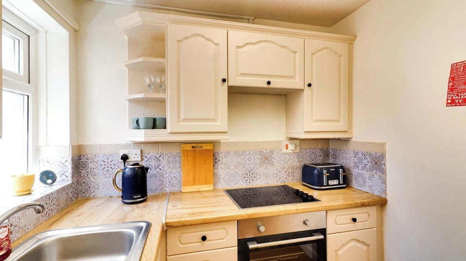 Whether you're preparing breakfast or cooking dinner, the kitchen provides everything needed for longer and more comfortable stays.