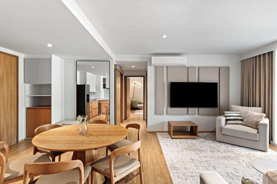 Deluxe Apartment, Balcony, Beach View | Living area | 75-inch LED TV with digital channels