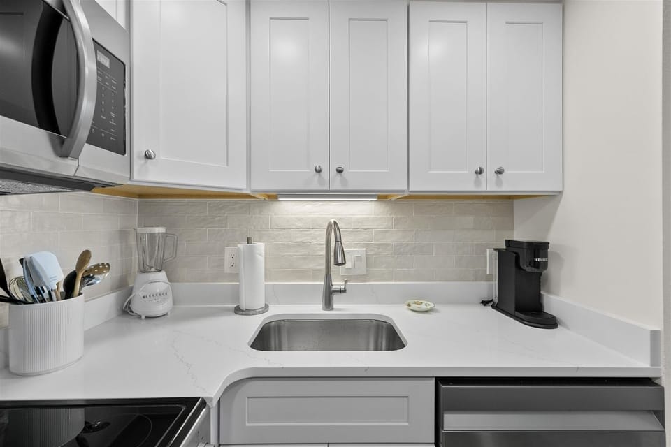 Thoughtful details and modern conveniences throughout the kitchen area.