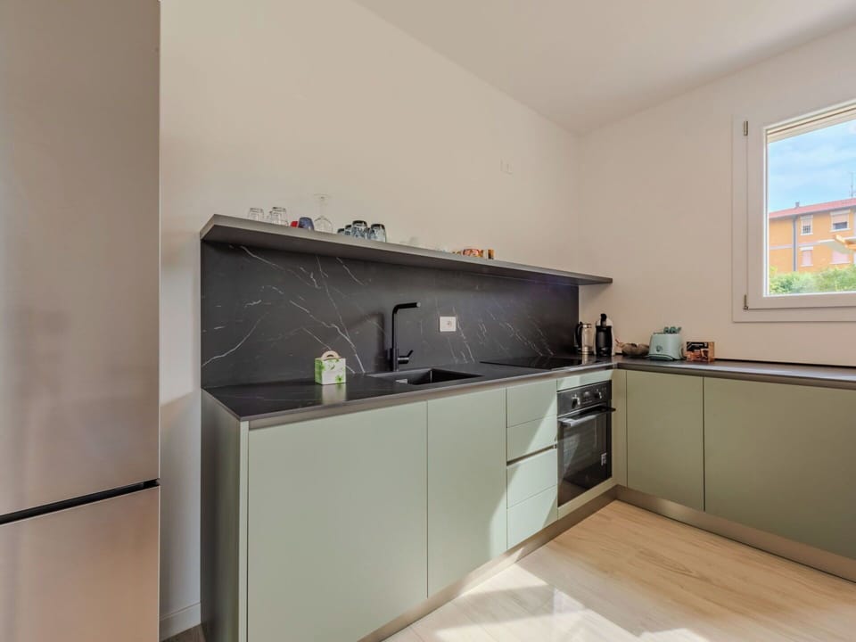 Kitchen, Countertop, Kitchen Appliance, Interior Design, Flooring, Cabinetry, Major Appliance, Furniture, Wood, Home Appliance