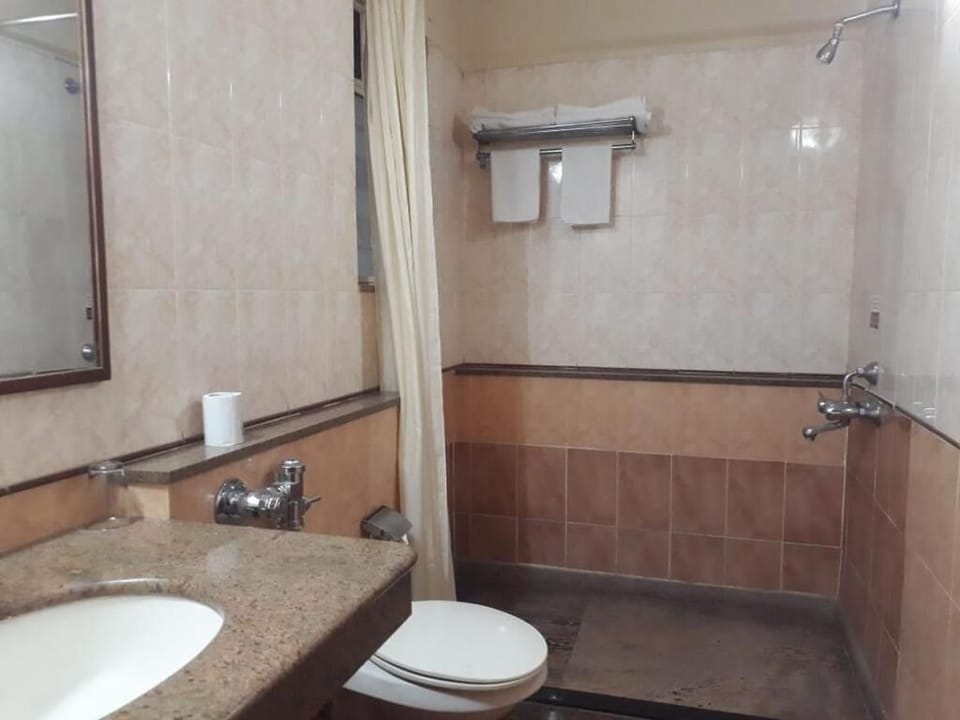 Shower, towels, soap, shampoo