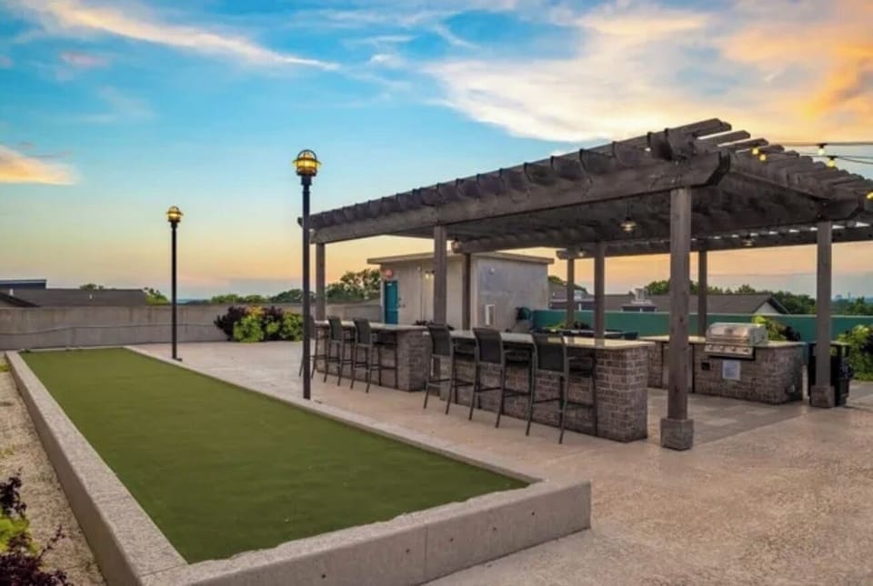 Rooftop bocce court, outdoor bar, and grilling station for your convenience 