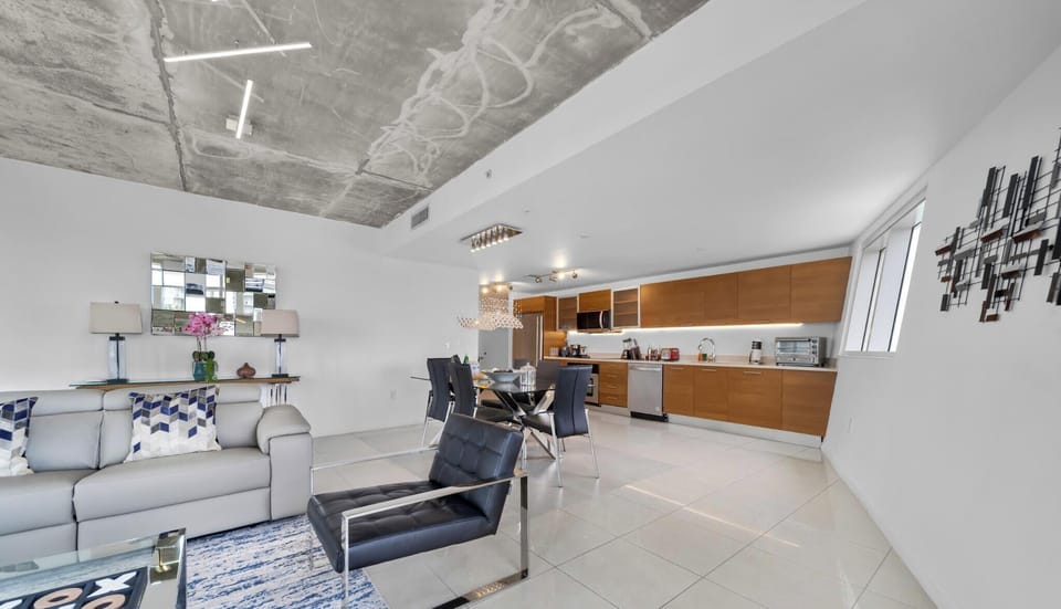 Condo, Balcony, City View | Living area | 36-inch Smart TV with cable channels