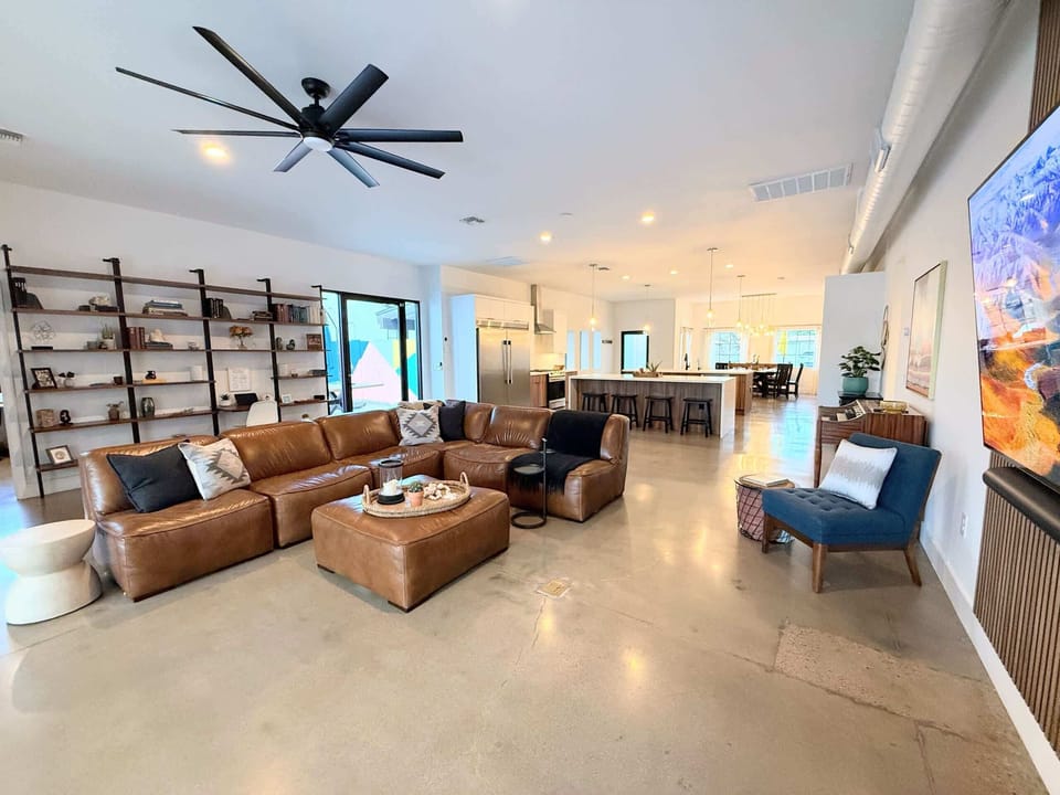 Open-Concept Great Room Flowing to Kitchen and Dining