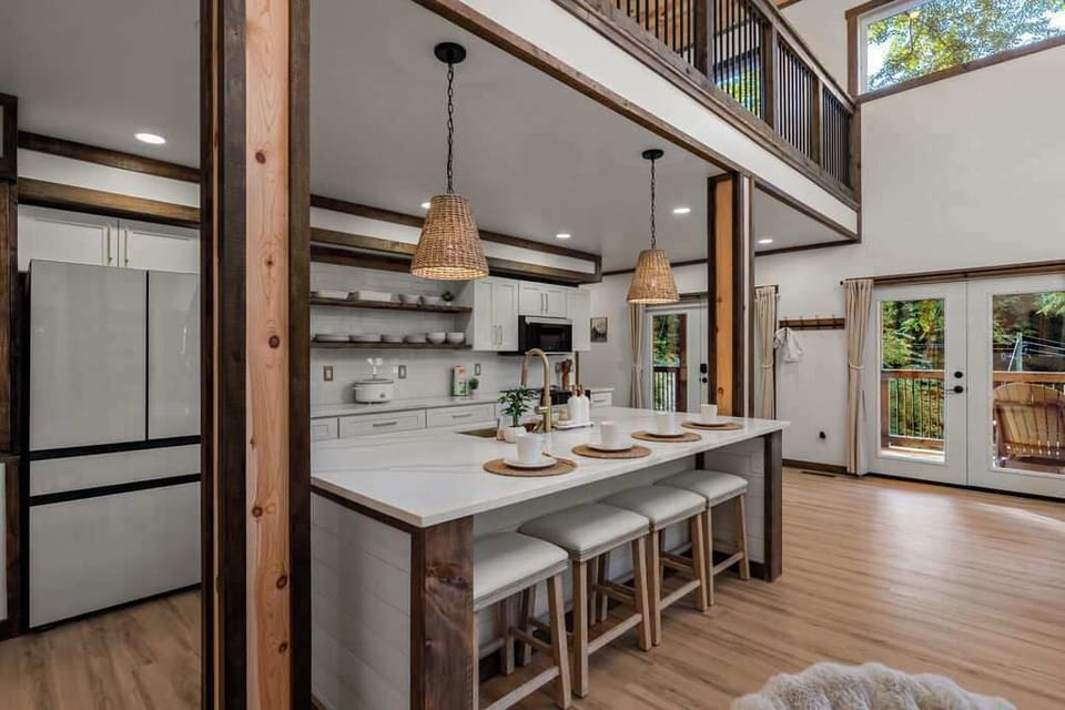 The heart of the cabin—an open-concept kitchen with a spacious island, perfect for gathering over meals and making memories.