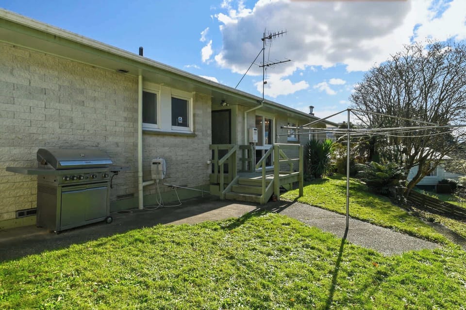 Gas BBQ and clothesline out back