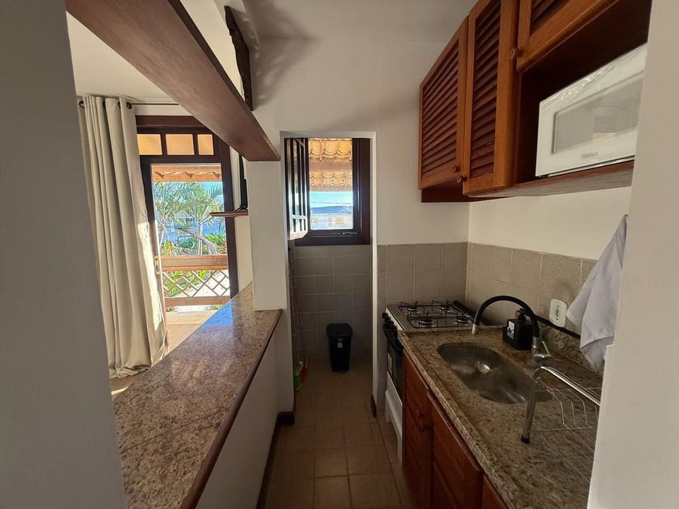 Mini-fridge, microwave, oven, stovetop
