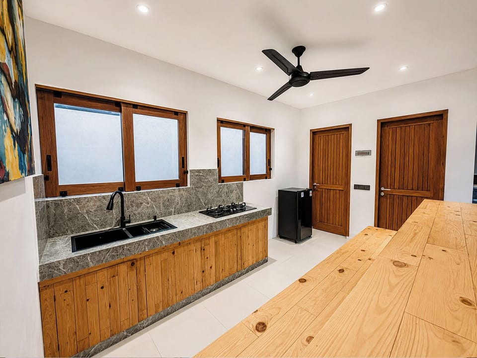 Deluxe Room, Garden View | Private kitchen | Full-size fridge, microwave