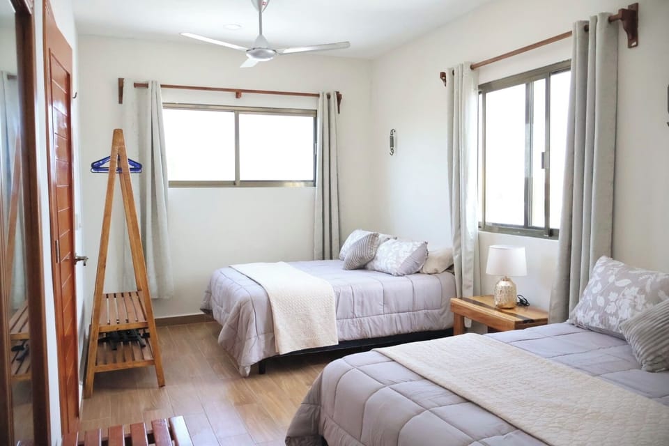 Family Room, 2 Queen Beds, Private Bathroom | WiFi (free)