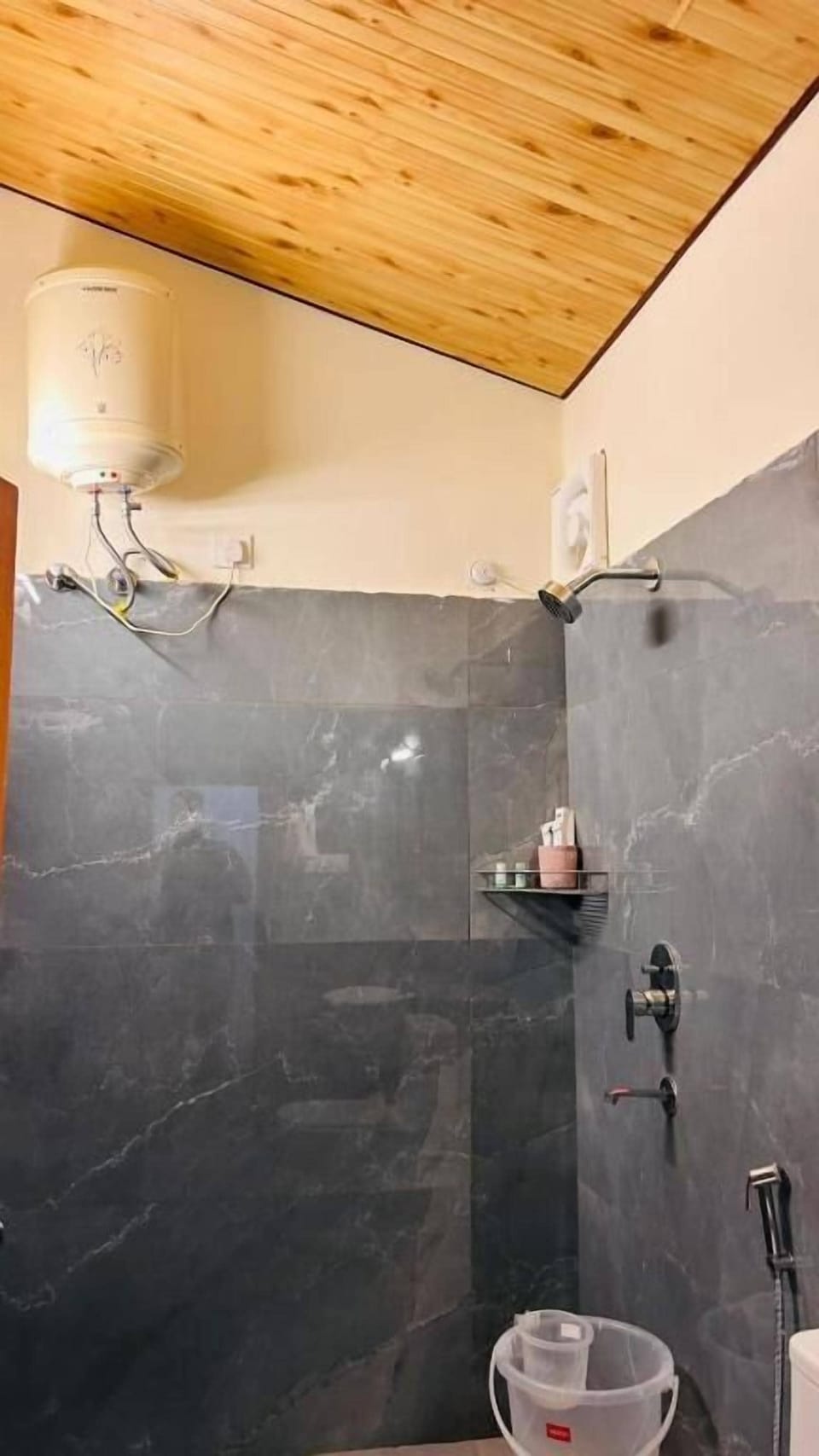 Shower, free toiletries, slippers, soap