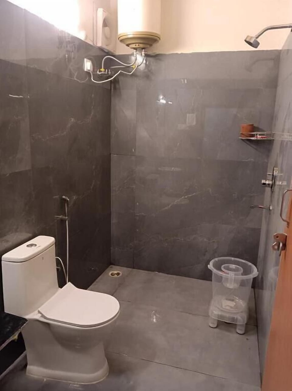Shower, free toiletries, slippers, soap