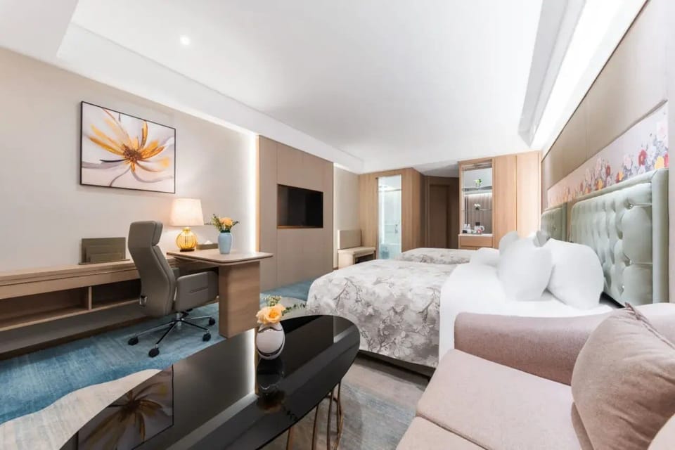 Business Twin Room, City View | Minibar, in-room safe, desk, laptop workspace