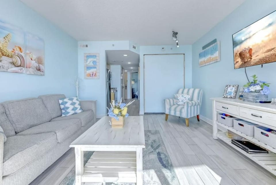 Relax in this bright beach-inspired living space.