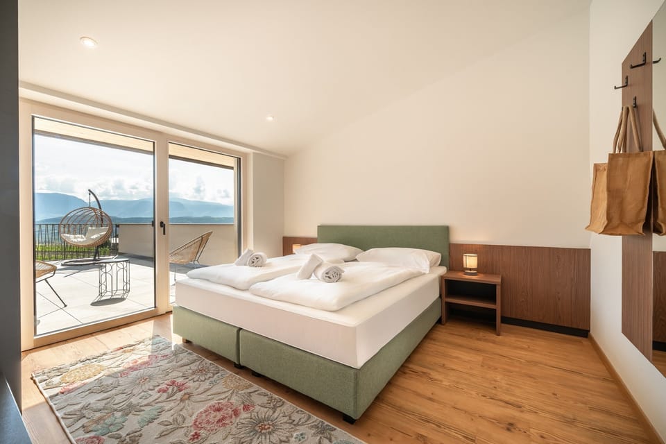 Bedroom with beds made up