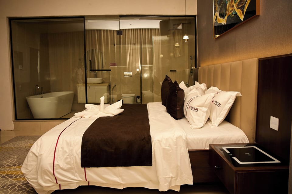Premium Suite, City View | Bathroom | Combined shower/tub, hair dryer, towels, soap