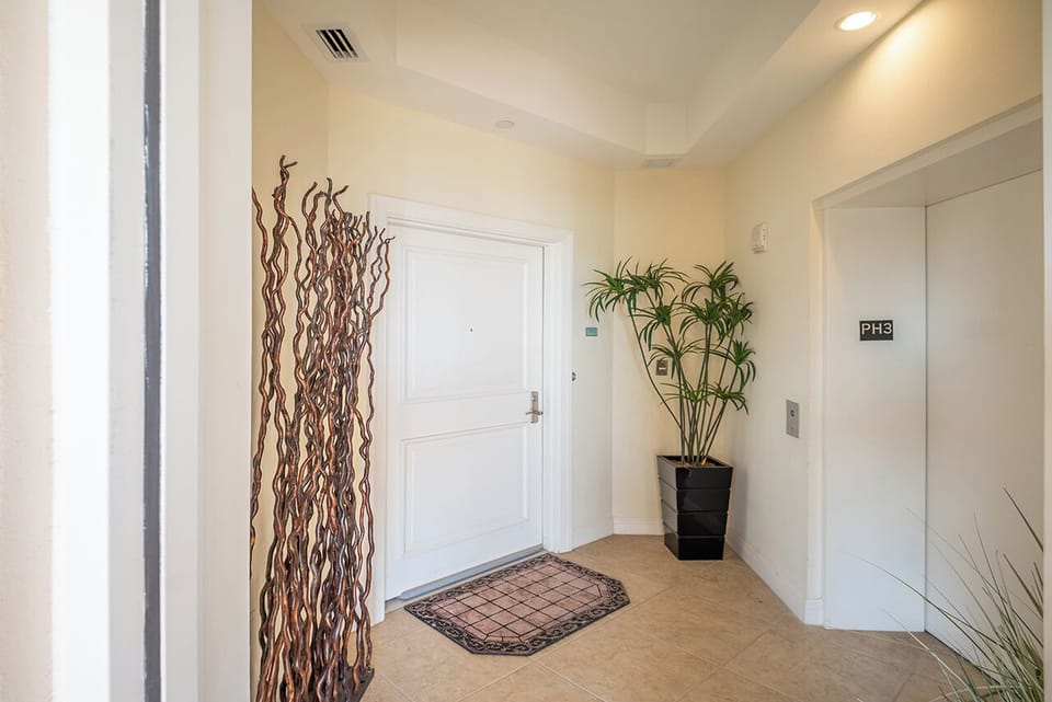 Your private elevator brings you to your front door.