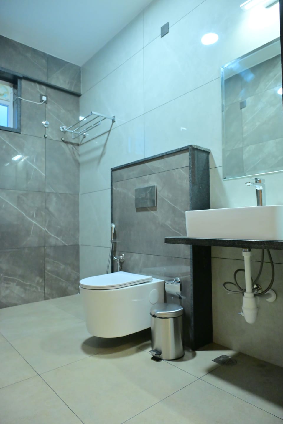 Shower, designer toiletries, hair dryer (on request), towels