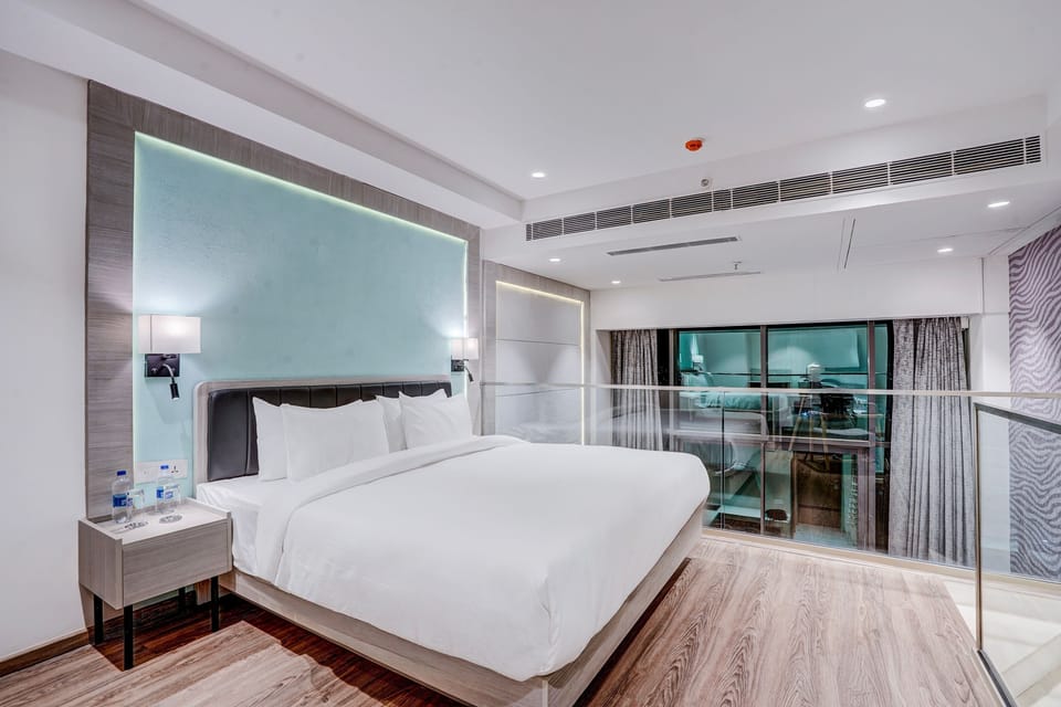 Premium Duplex, Balcony | Desk, iron/ironing board, WiFi (free), bed sheets