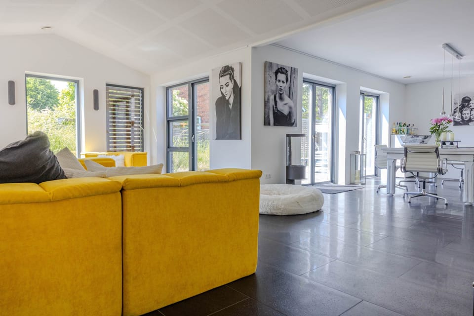Yellow sofa by the window