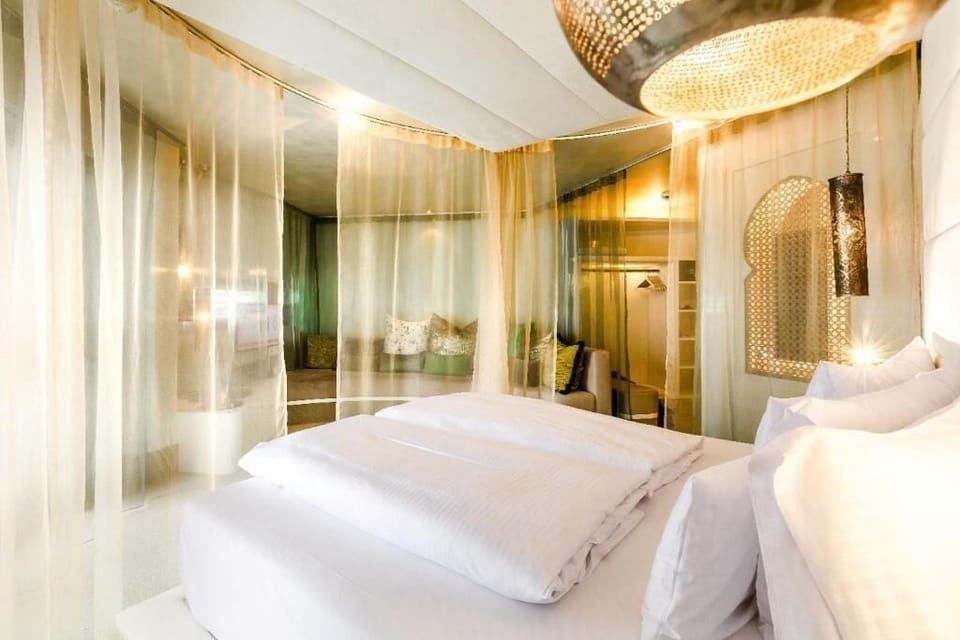 Superior Suite, Balcony, Courtyard View | Hypo-allergenic bedding available, in-room safe