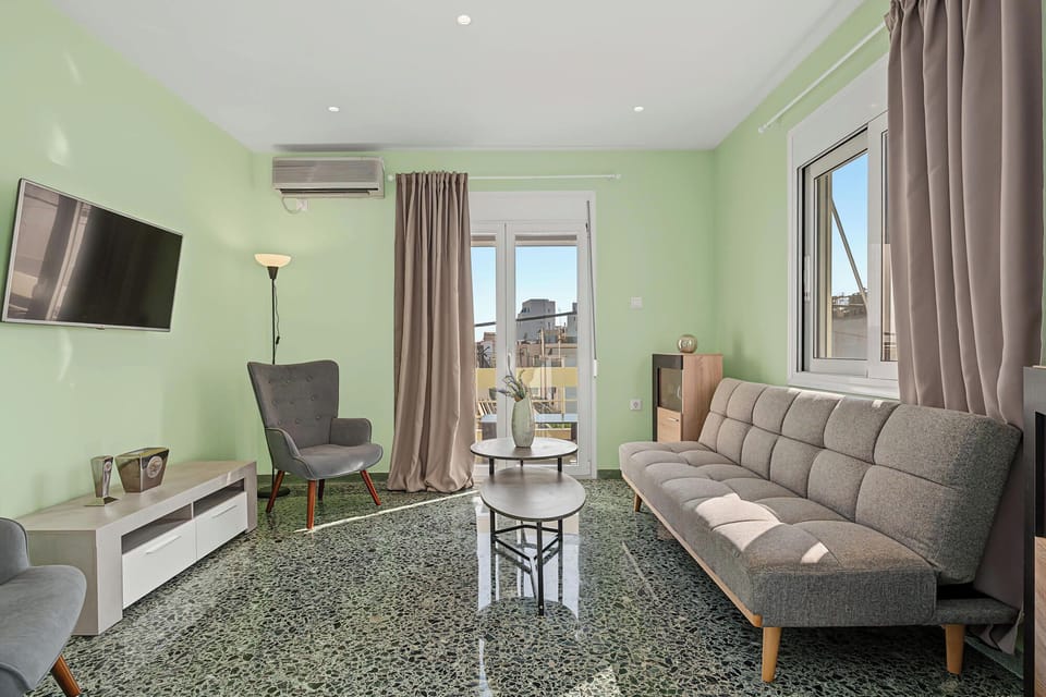 Living room with soft green tones