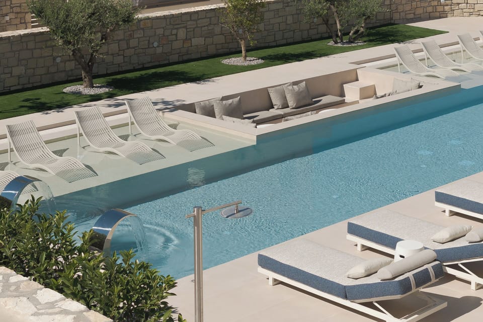 Bespoke pool design invites relaxation from sunrise to sunset.