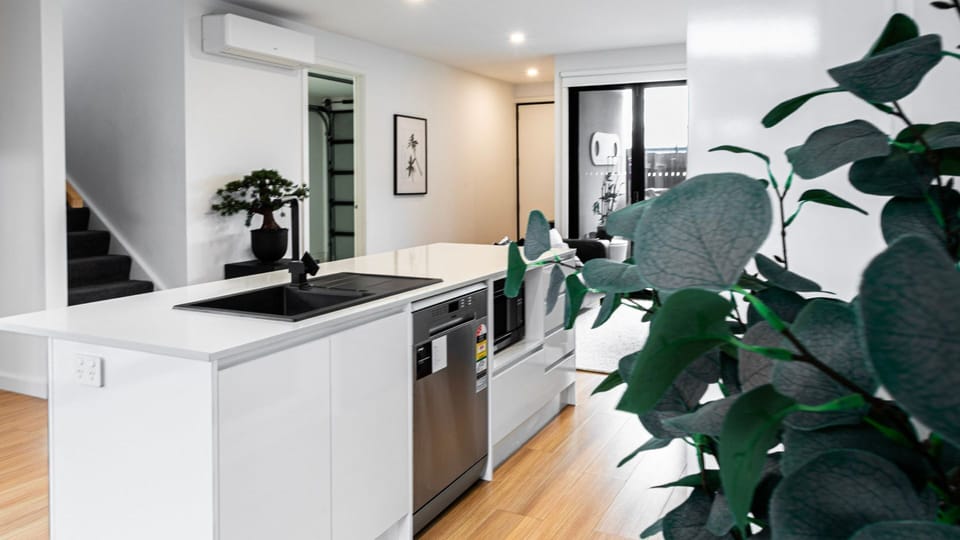 Prepare your favourite meals in the fully equipped kitchen with generous bench space.