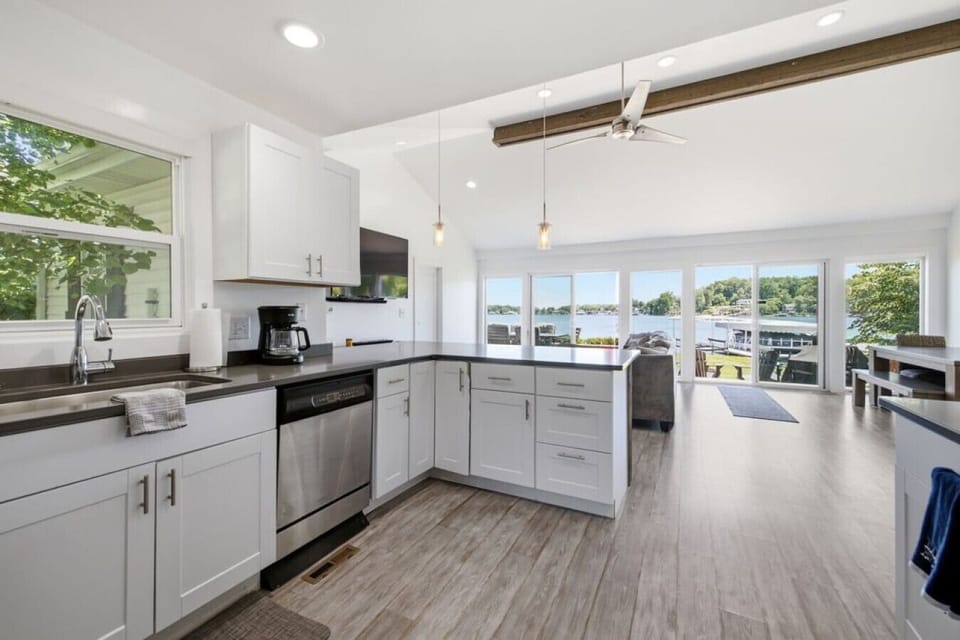 Kitchen and dining stay close to the lakefront view