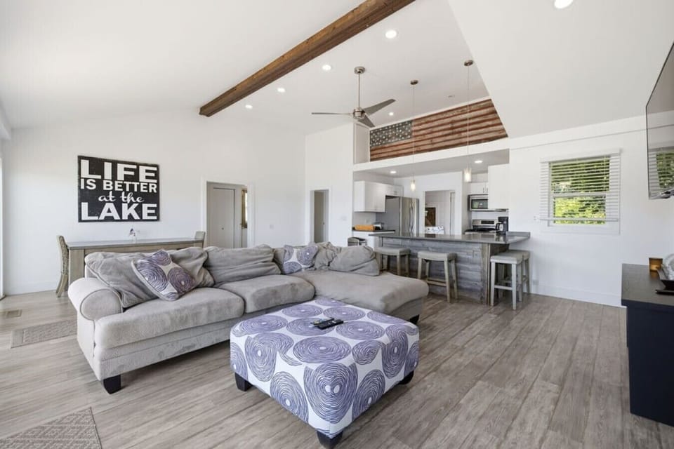 Life IS better at the lake in this bright main living space!