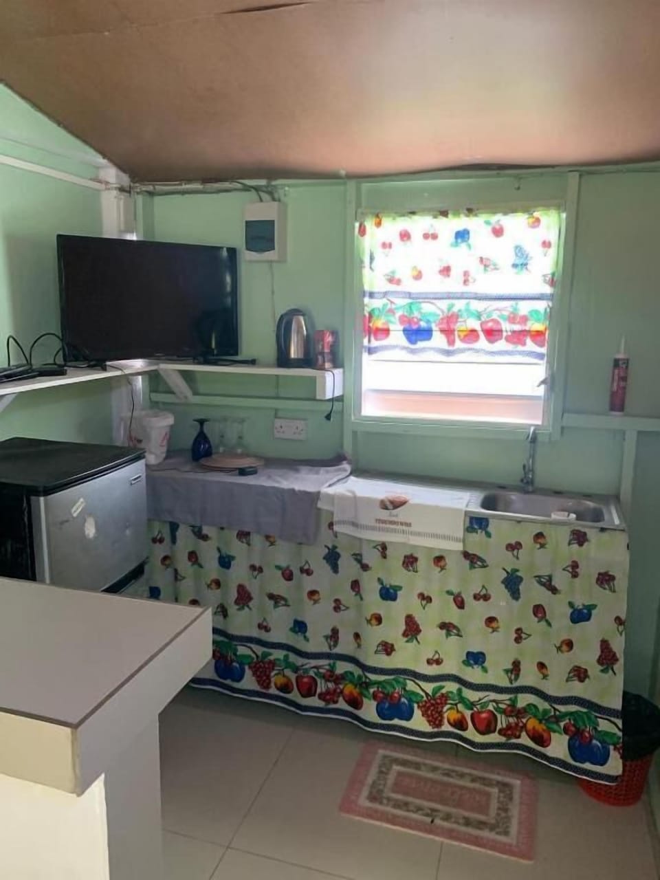 Toaster oven, cleaning supplies, paper towels