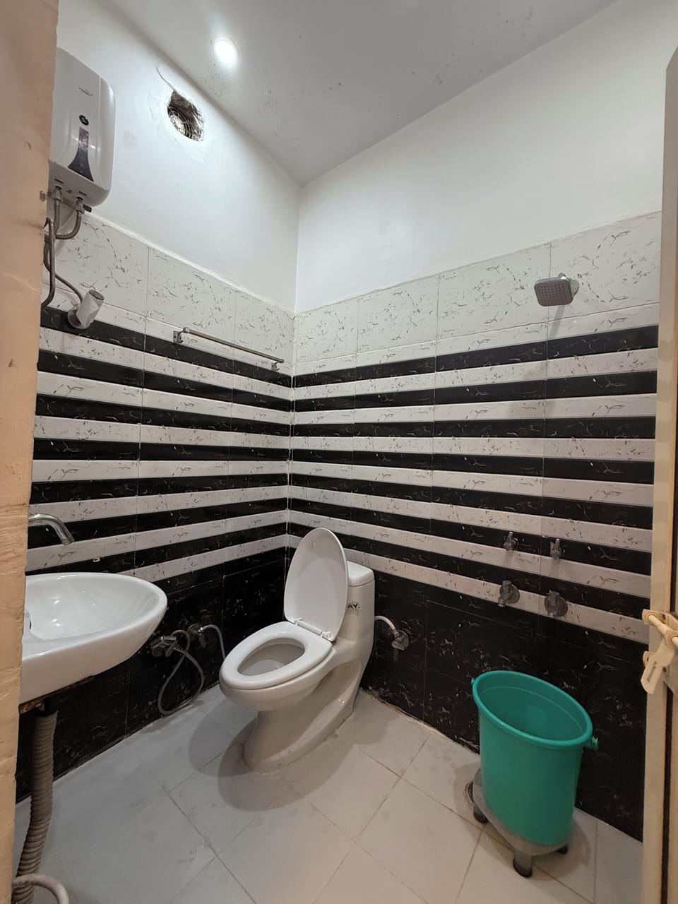 Shower, slippers, towels, soap