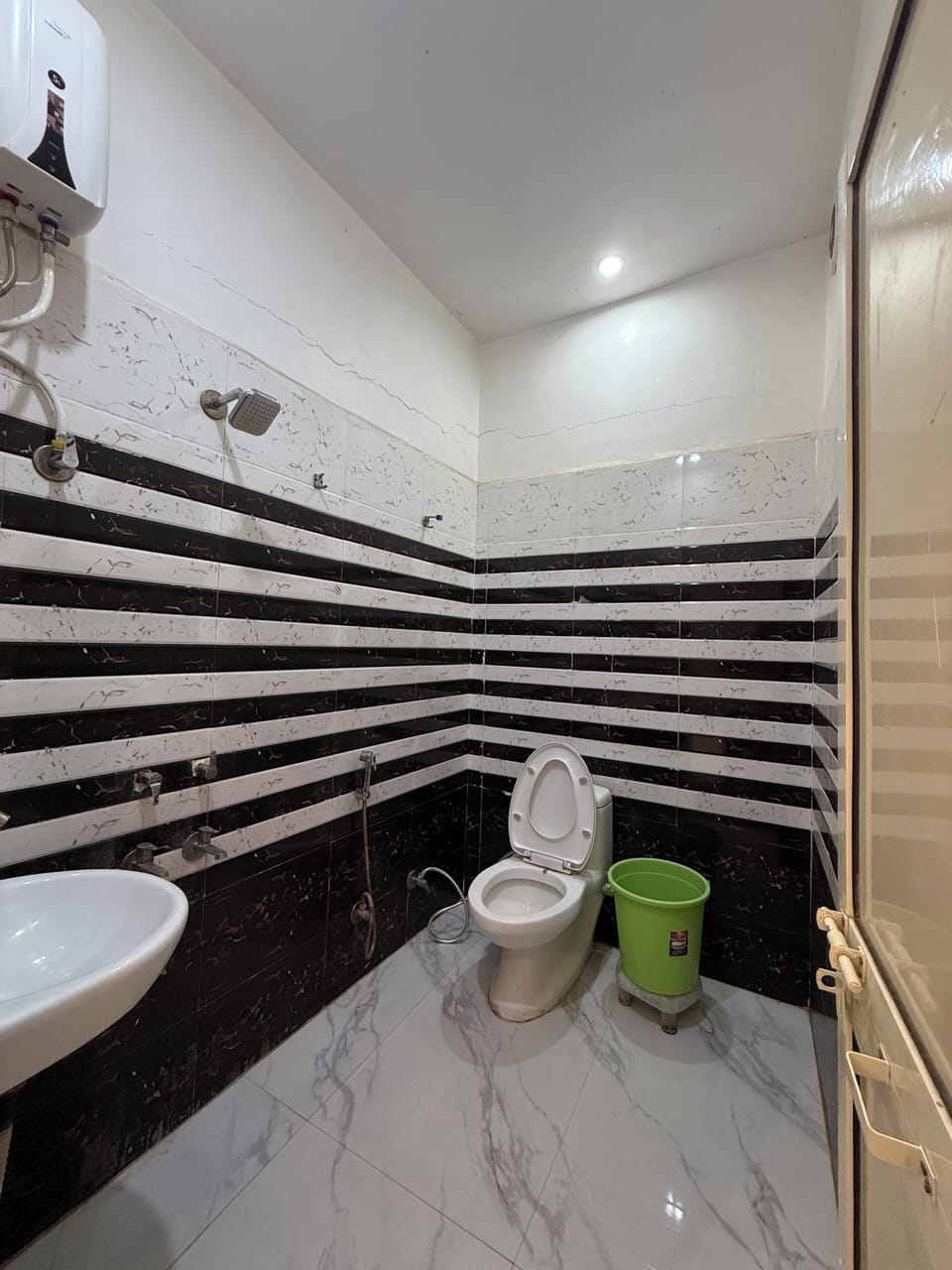 Shower, slippers, towels, soap