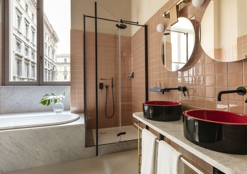 Junior Suite | Bathroom | Rainfall showerhead, designer toiletries, hair dryer, bidet