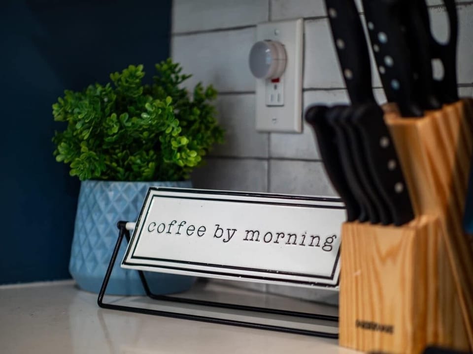 Unwind with a cup of coffee in our cozy kitchen nook, perfect for morning conversations."