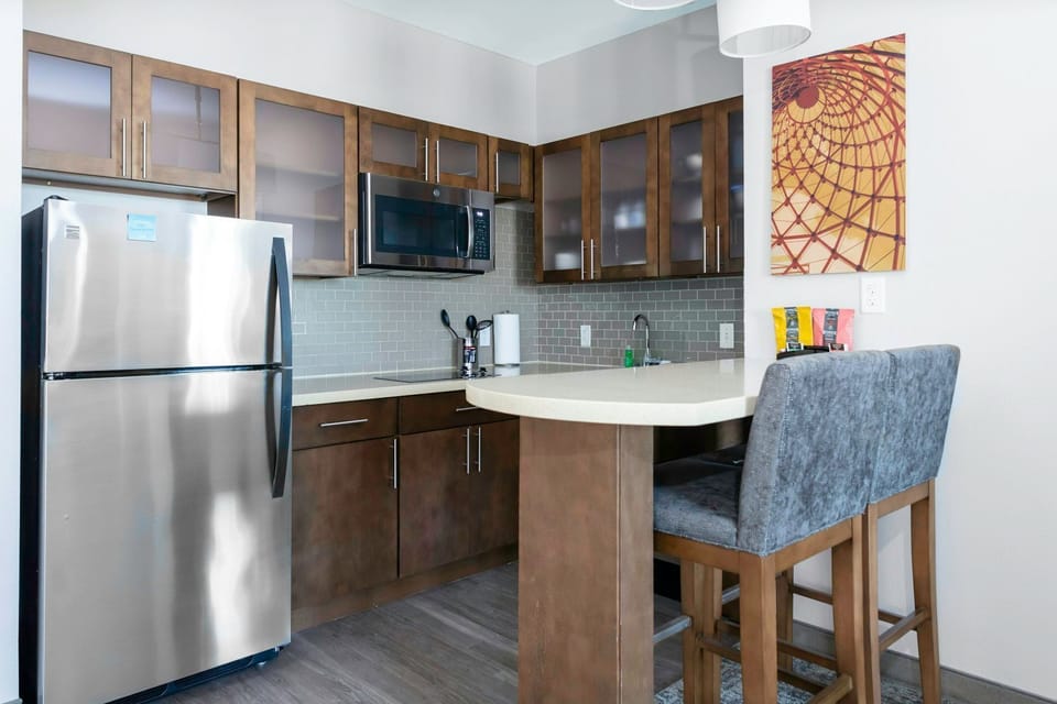 Prepare your favorite meals in this fully equipped kitchen, complete with modern appliances.
