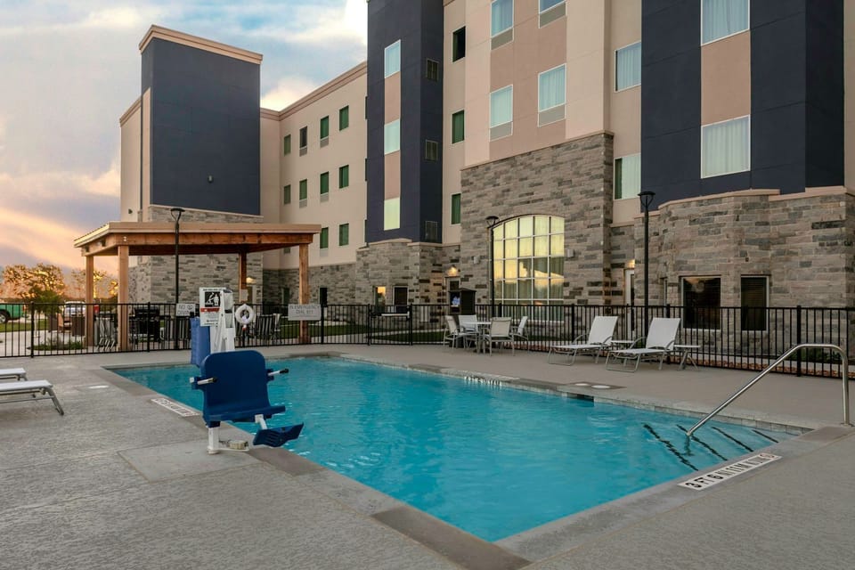 Dive into relaxation at the inviting outdoor pool, perfect for unwinding under the sun.