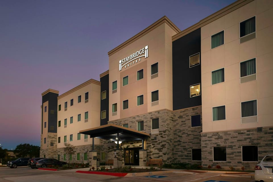 Arrive to modern comfort with a welcoming exterior, perfect for your stay near Cedar Park.