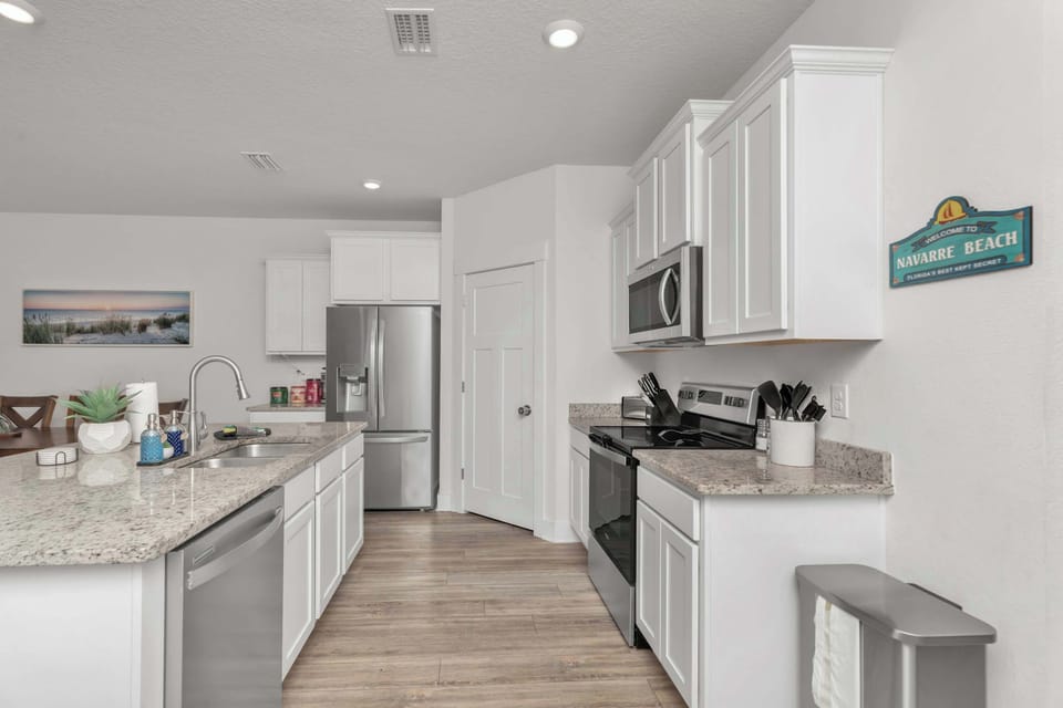 Fully Stocked Kitchen with Stainless Steal Appliances