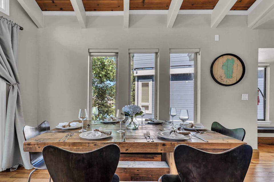 Dining area: Dining table with seating for 4, bar with 3 bar stools
