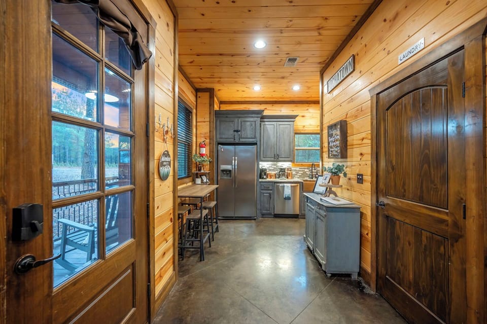 Convenient kitchen, breakfast bar, and laundry - all with comforts of home.  