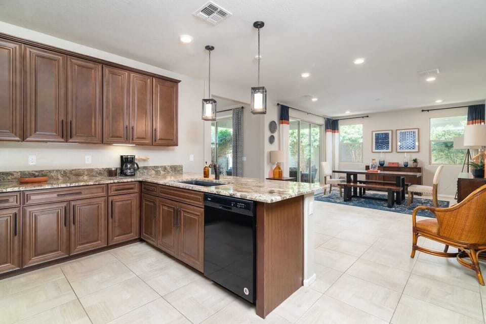 The open-concept layout creates the perfect space for cooking, dining, and spending quality time together.