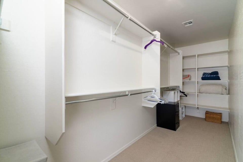The oversized walk-in closet provides plenty of storage to help you settle in and feel right at home during your extended stay.