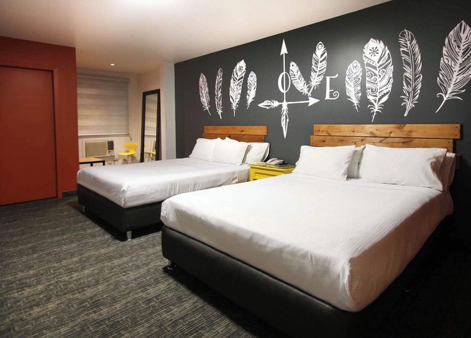 Standard Double Room, City View | Laptop workspace, WiFi (free), bed sheets