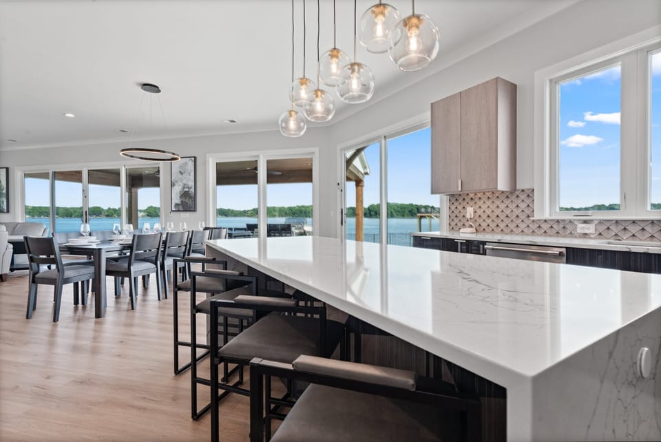 Enjoy the fully stocked kitchen to prep all your group meals with large island.