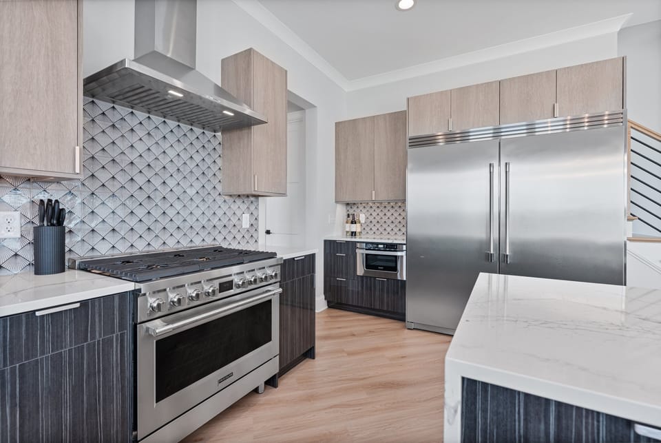 Chef appliances in the fully stocked kitchen.